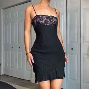 Vintage Express Black and pink lace dress with ruffle hem